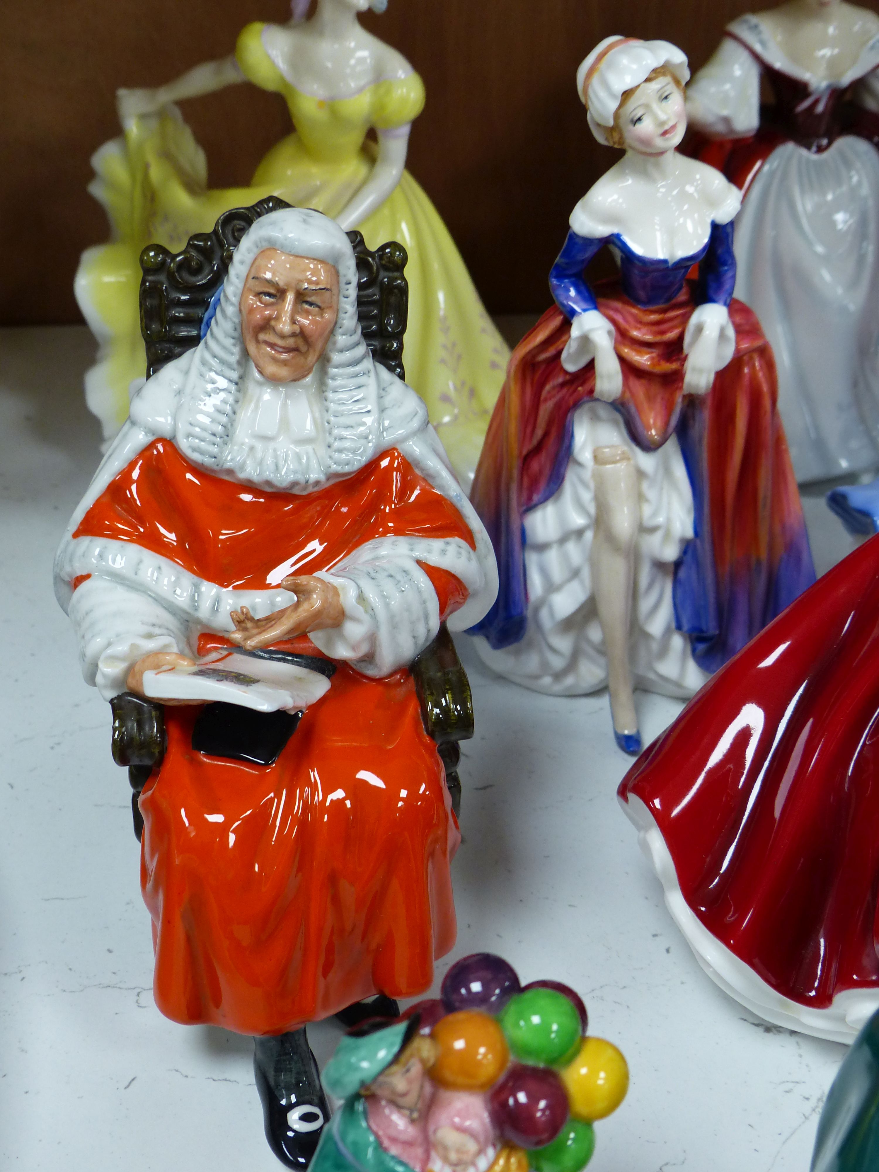 Ten Royal Doulton figurines, including 'Sara', 'The Judge', 'The Old Balloon Seller', 'Elaine' and others